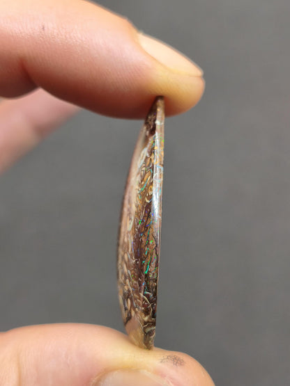 Boulder Opal AAA Sammlerstein Mineralien Kristalle Cabochon natürlich Heilstein Rarität Muster Australien Queensland