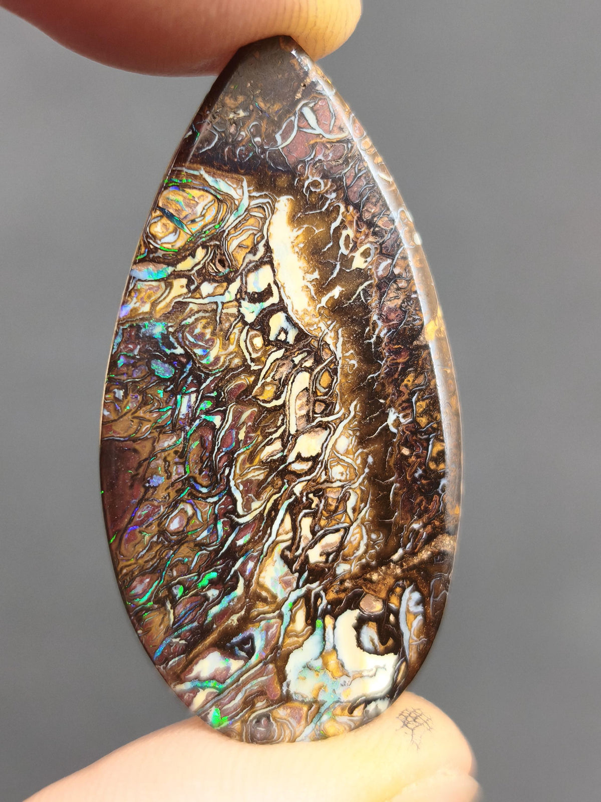 Boulder Opal AAA Sammlerstein Mineralien Kristalle Cabochon natürlich Heilstein Rarität Muster Australien Queensland